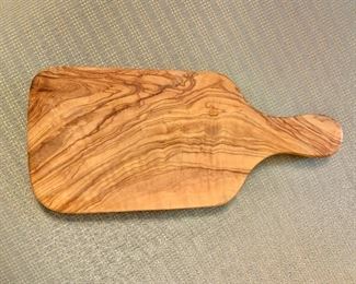 $20 - Burl wood cutting board; 11" L x 5" W