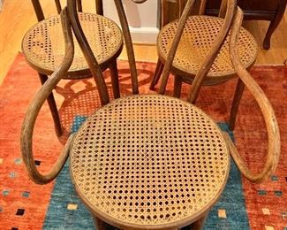 $250 - Three Bentwood chairs: two-arm chair 35" H x 22" W x 23" depth and 18" seat height; two (2) chairs 35" H x 17" W x 16" depth and 18" seat height