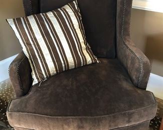 Woodmark by Howard Miller Wingback Chair in Chocolate with Nailhead Accents..

