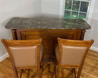 Marble topped bar with leather stools