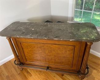 Marble topped bar with leather stools