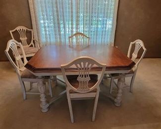 Dining Room Table 43 x 58 and 5 Chairs. Has 3 Leaves That Do Not Match the Table. Captain Chair is Cracked.