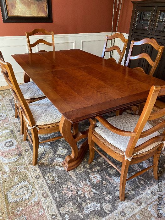 National Mt Airy cherry trestle dining table with 2 leaves, pads, 2 arm chairs, and four side chairs.