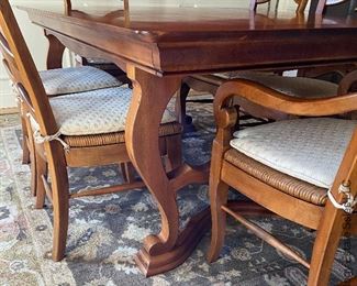 National Mt Airy cherry trestle dining table with 2 leaves, pads, 2 arm chairs, and four side chairs.