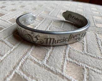 Limited edition pewter bracelet made for Paul McCartney and Fidelity Investment’s charity Music Lives Foundation. 