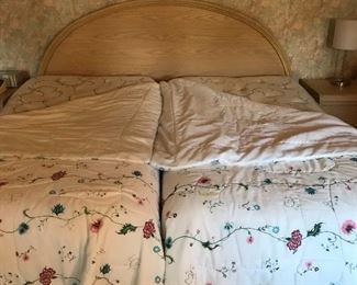 Two twin beds put together to accommodate a king size headboard.