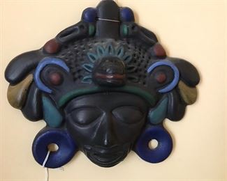 Another interesting pottery wall piece