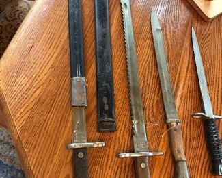 These swords and knives are very interesting. 2 have scathes. Still researching.