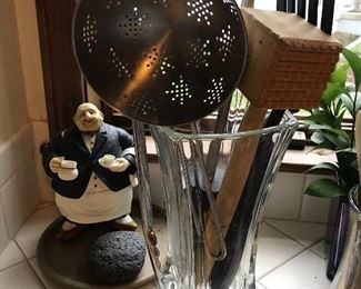 Kitchen utensils. Love the little serving guy holding your cup of tea.