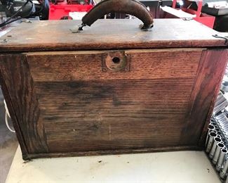Wonderful oak jewelers box with leather handle. Do not lift with handle