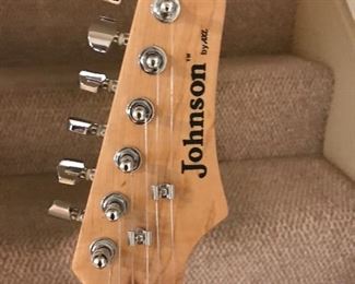 What a find. Johnson y Axl Electric Guitar with accessories in case. Excellent condition.