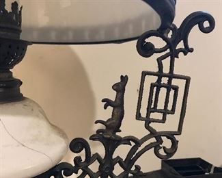 This lamp has the most whimsical Iron work. Look at the bunny on the holders.