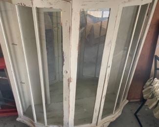 Small antique glass door display cabinet