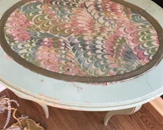 Antique side table with marbled fabric inlay 