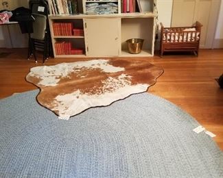 Braided Rug and Cow Hide Rug