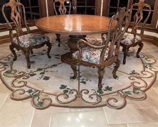 Kitchen table and six chairs (4 pictured here), scalloped rug