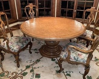Round wood dining table and 6 chairs 