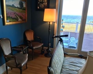 Arm chairs and lighting, great view of the Bay!