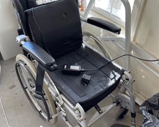 Two wheelchairs, other home health equipment