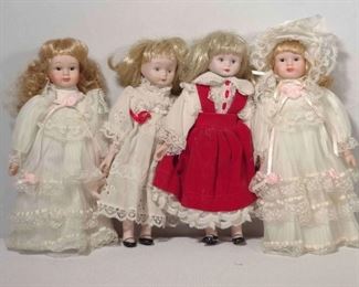 4 Glazed Porcelain Dolls