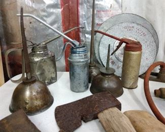 Antique oil cans, axes w/handles, antique Bike pump 