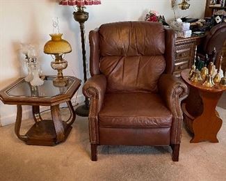 leather wing back recline, Aladdin lamps, oak tables, collection of school bells