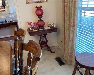 Mahogany game table with cranberry Fenton GWTW lamp