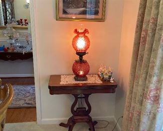 GWTW Fenton cranberry parlor lamp. Lights both top and bottom. harp game table