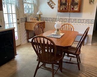 mission style farm table with four chairs