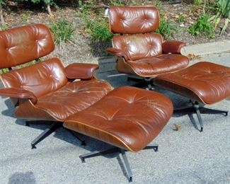 Two Eames, Herman Miller lounge chairs ottomans