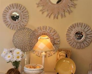 There is a large assortment of beautiful home decor, dinnerware, planters and lamps.  