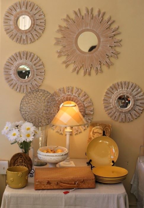 There is a large assortment of beautiful home decor, dinnerware, planters and lamps.  