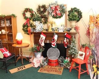 The stockings are hung by the chimney with care.  The mantel and hearth are also for sale, along with lots of Christmas wreaths, Christmas picks, door mats and much more.  