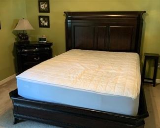#1 black wood queen frame with solid side $375.00
#2 Queen Sealy mattress set clean had a cover on it $200.00