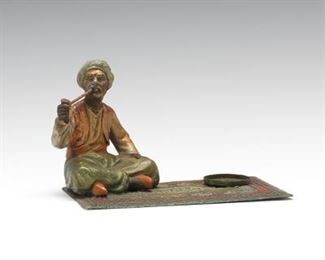 Austrian Cold Painted Metal Figure of an Arab Man on a Rug