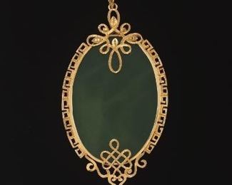 Carved Jade Pendant in Gold 