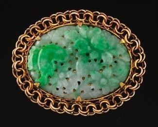 Carved Jadeite and Gold Brooch 