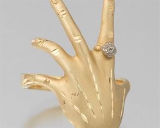 Ladies Diamond Ring on a Hand Gold and Diamond Ring