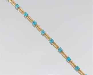 Ladies Gold and Blue Topaz Bracelet 