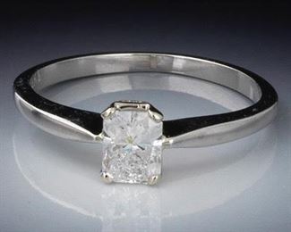 Ladies Gold and Diamond Solitaire Ring 