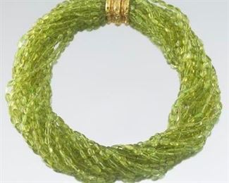 MAZ 18k Gold and 1000 ct Peridot Torsade Necklace 