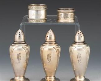 Three Salt Shakers and Two Napkin Rings