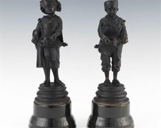 Two Patinated Spelter Cabinet Sculptures
