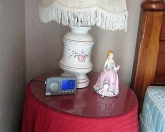 Bed side lamp table, lamp, figurine, and clock