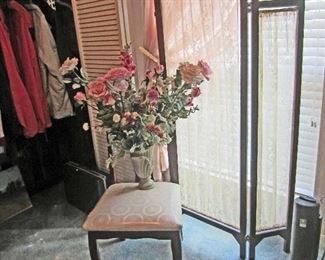 Screen with fabric panels, chair and flower arrangement 