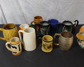 A bakers dozen of unique mugs.