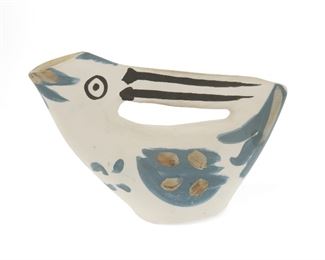 1002
Pablo Picasso
1881-1973, Spanish
"Pichet Anse Prise," 1953
Terre de faïence ceramic pitcher
Edition 110/200; impressed and numbered: Edition Picasso / Madoura / Plein Feu / Edition Picasso / 110-200 / Madoura
7.75" H x 12.5" W x 4.5" D
Estimate: $6,000 - $8,000