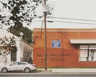 1057
An-My Lê
b. 1960, Vietnamese/American
"Fragment I: Graffiti, November 9, New Orleans, Louisiana," From Silent General, 2016
Inkjet print on plastic board under Optium
Edition 3/5; unsigned, no. 19899; number and edition sequencing by repute
40" H x 56.5" W
Estimate: $1,000 - $2,000