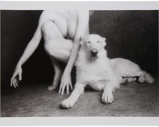 1066
Yuri Dojc
b. 1946, Canadian
"Dog Lady"
Photographic print on Hahnemuhle photo rag paper
Edition 2/5; signed lower right: Yuri Dojc; with the artist's blindstamp lower left
Image: 24" H x 35.75" W; Sheet: 28" H x 40" W
Estimate: $1,500 - $2,000