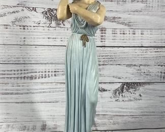 Antique Statue of a Woman in a Light Blue Toga